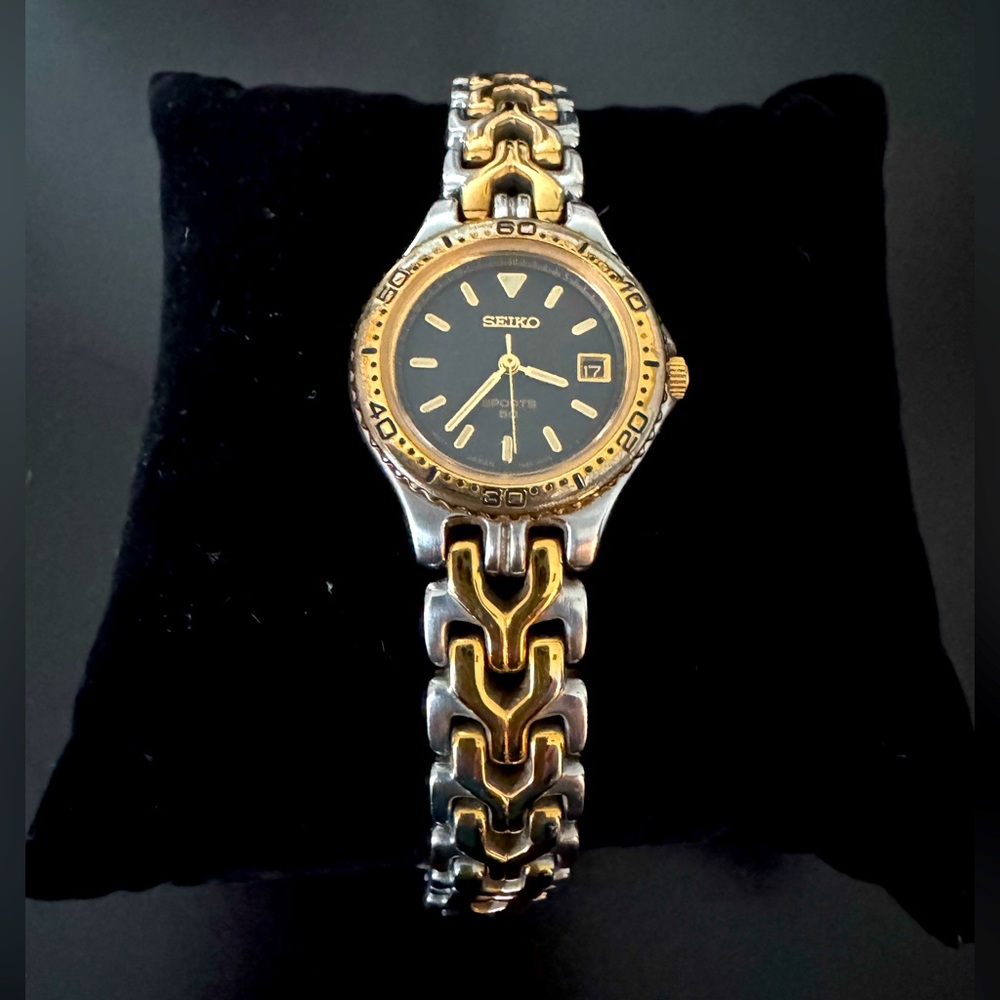 Seiko women's watch, two-tone, stainless steel base, metal bezel w/date